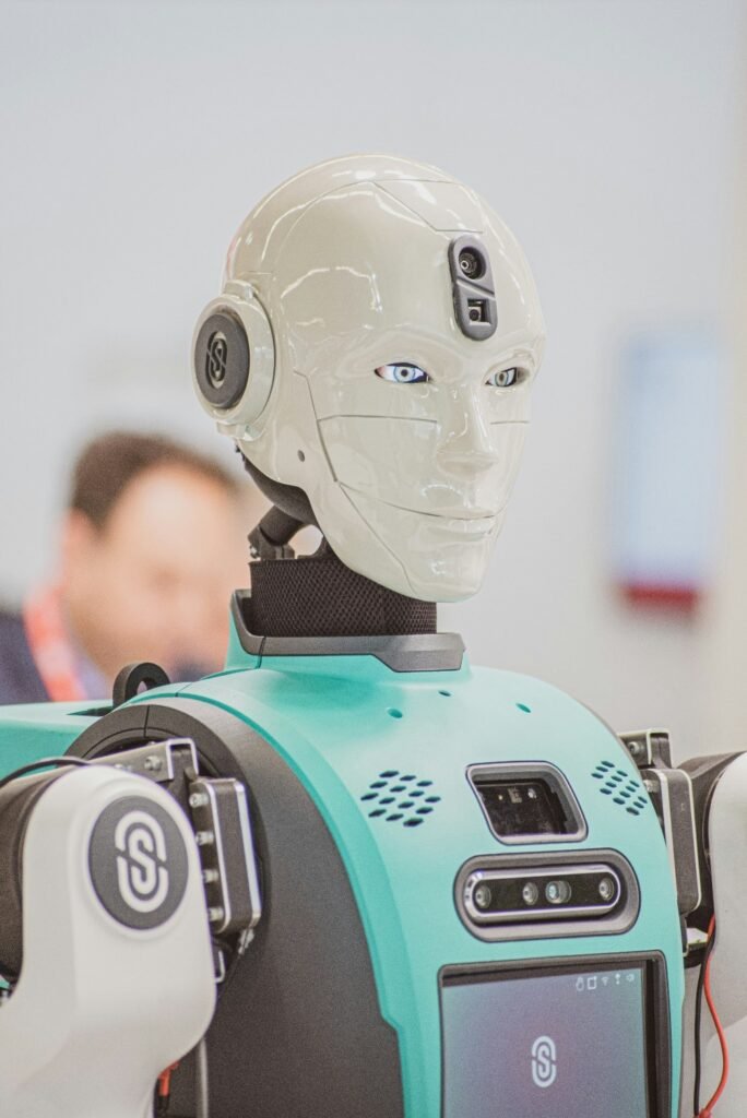 Close-up of a humanoid service robot with sensors and cameras integrated into its head and torso