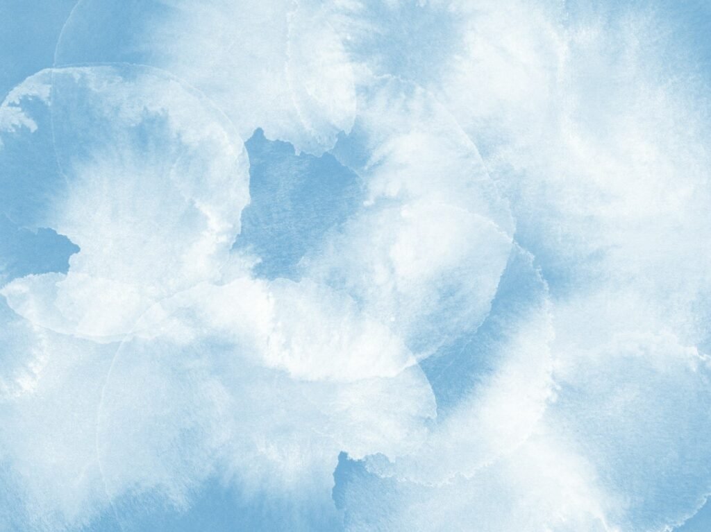 Abstract image of soft blue clouds representing cloud computing and edge-to-cloud connectivity.