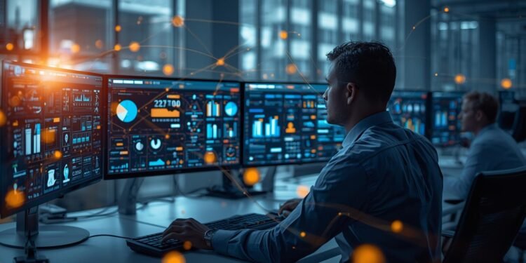 Network engineer monitoring connected IoT devices and smart systems on multiple screens in a modern office, illustrating how devices communicate intelligently.