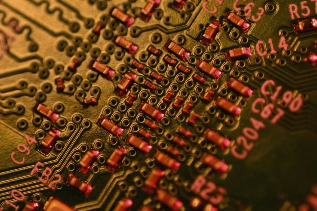 Close-up macro image of a circuit board with electronic components representing secure quantum cryptography hardware.